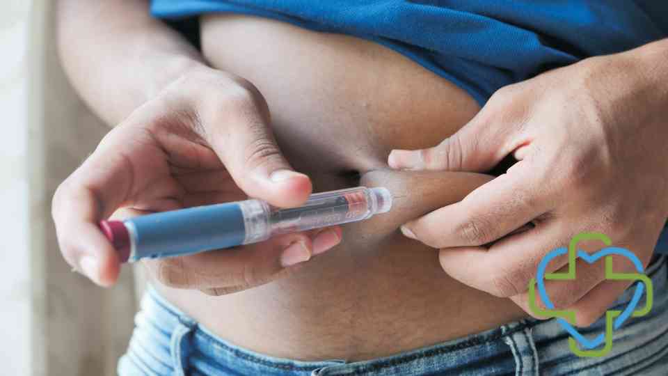 person injecting weight loss injection into their stomach